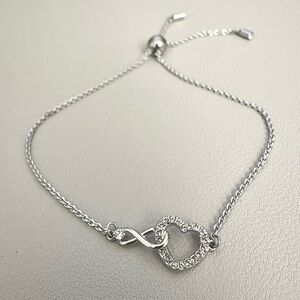 SWAROVSKI Hyperbola Infinity and Heart  Rhodium Plated Elegant Silver Bracelet